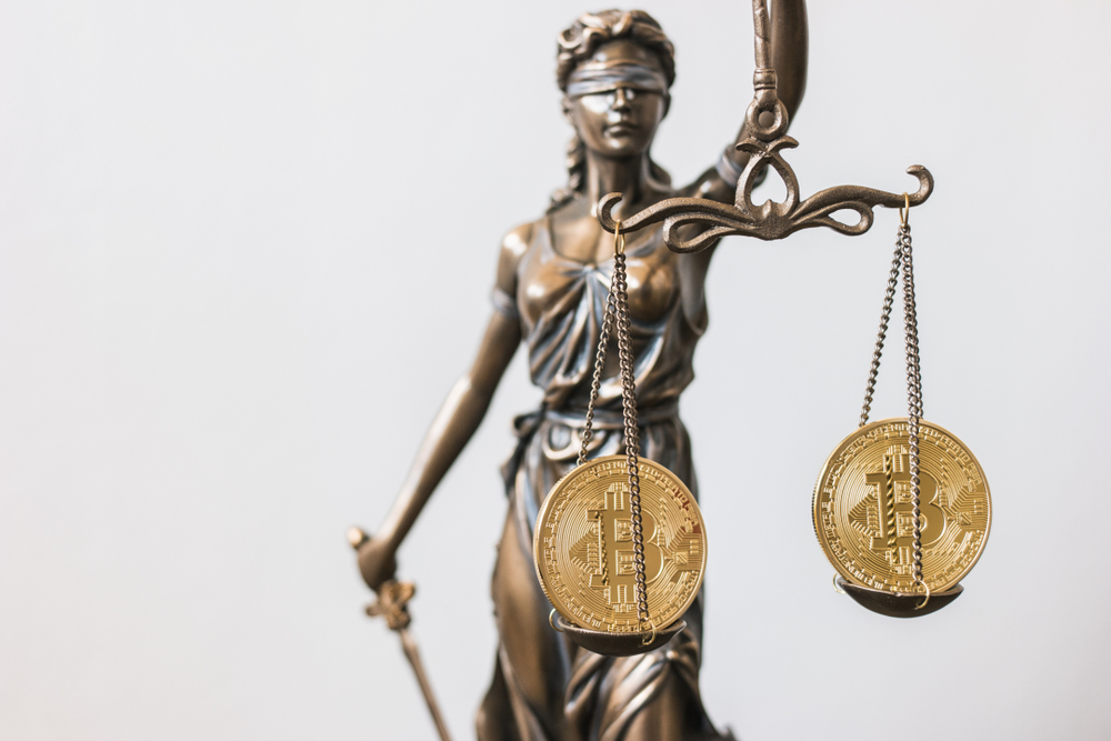 The Statue of Justice with Bitcoin cryptocurrency